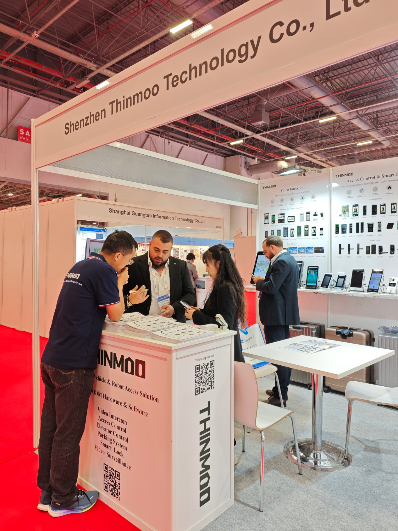 A visitor reviewing solutions at the counter