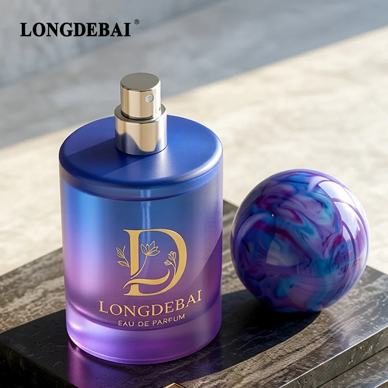 Bottlija tal-framment b’forma ċilindrika b’effett frosted u gradjent, b’kapaċitajiet ta' 30ml, 50ml jew 100ml, b’kap ta' resina bil-forma ta' bola