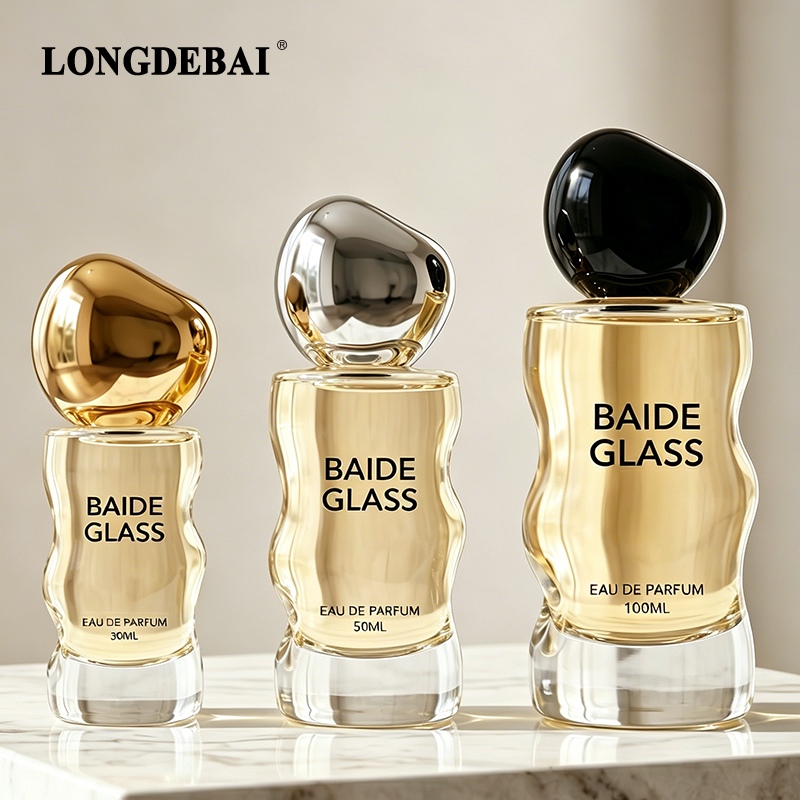 Bottlija tal-perfum ta' ġlass b’forma ta' mewġa, b’kapaċitajiet ta' 50ml jew 100ml, b’kap ta' plastika, b’mudell privatu personalizzat