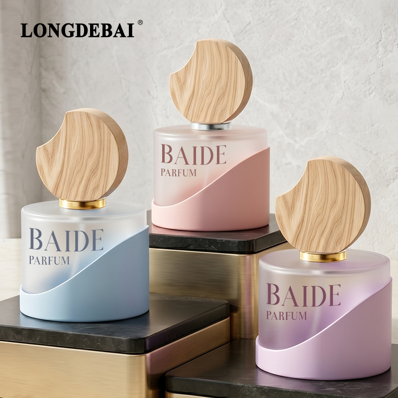 bottli ta' parfum bil-glass bil-forma tonda, għall-biżness, ta' 30ml, 50ml, u 100ml, b'kappetta ta' leżer bil-forma tal-qamar