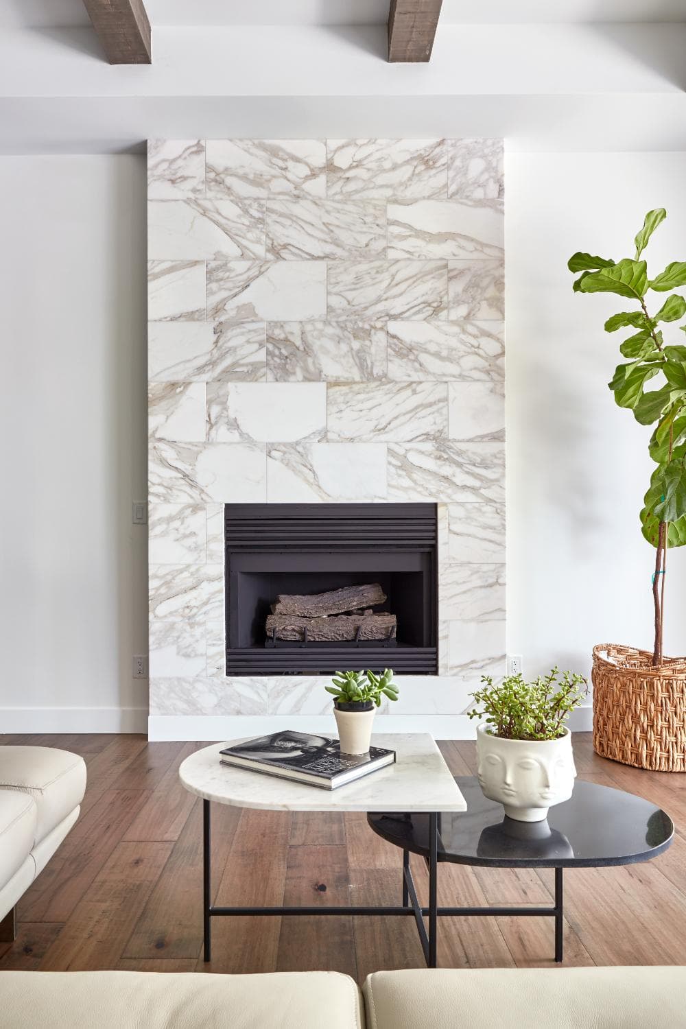 Calacatta-gold-marble-fireplace-tile.jpg